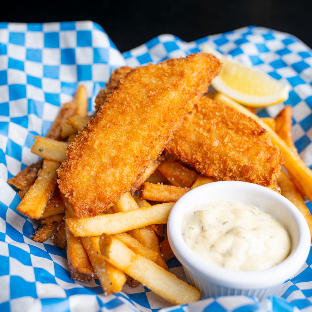 Two pieces of panko-crusted fish with fries.