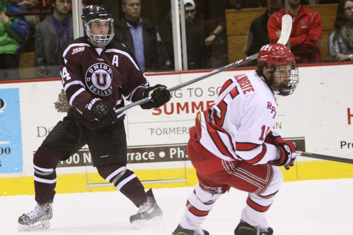 Shayne Gostisbehere, left, in action against RPI on Friday night at Messa Rink. The Dutchmen won 4-3 over their archrivals from Troy.