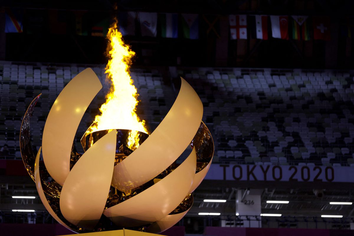 This picture shows the Olympic cauldron and flame during the opening ceremony of the Tokyo 2020 Olympic Games, at the Olympic Stadium, in Tokyo, on July 23, 2021.