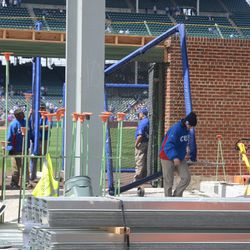 12:32 p.m. Batting practice equipment being stowed in right field - 