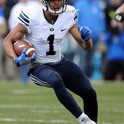 Brigham Young Cougars receiver Moroni Laulu-Pututau (1) runs after making a catch during a spring football scrimmage at LaVell Edwards Stadium in Provo, Saturday, March 26, 2016.