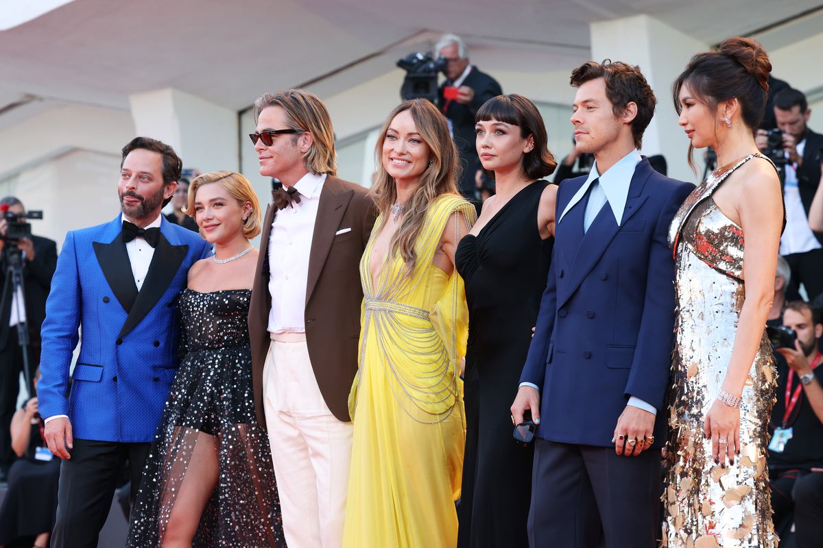 Nick Kroll, Florence Pugh, Chris Pine, Olivia Wilde, Sydney Chandler, Harry Styles, and Gemma Chan attend the “Don’t Worry Darling” red carpet at the 79th Venice International Film Festival on September 5, 2022, in Venice, Italy.