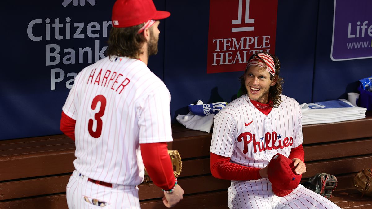 Bryce Harper and Alec Bohm of the Philadelphia Phillies speak before playing against the Pittsburgh Pirates at Citizens Bank Park on September 26, 2023 in Philadelphia, Pennsylvania.