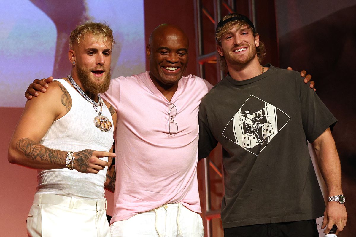 Former UFC champion Anderson Silva along with brothers Logan and Jake Paul at a presser in Hollywood in September. 