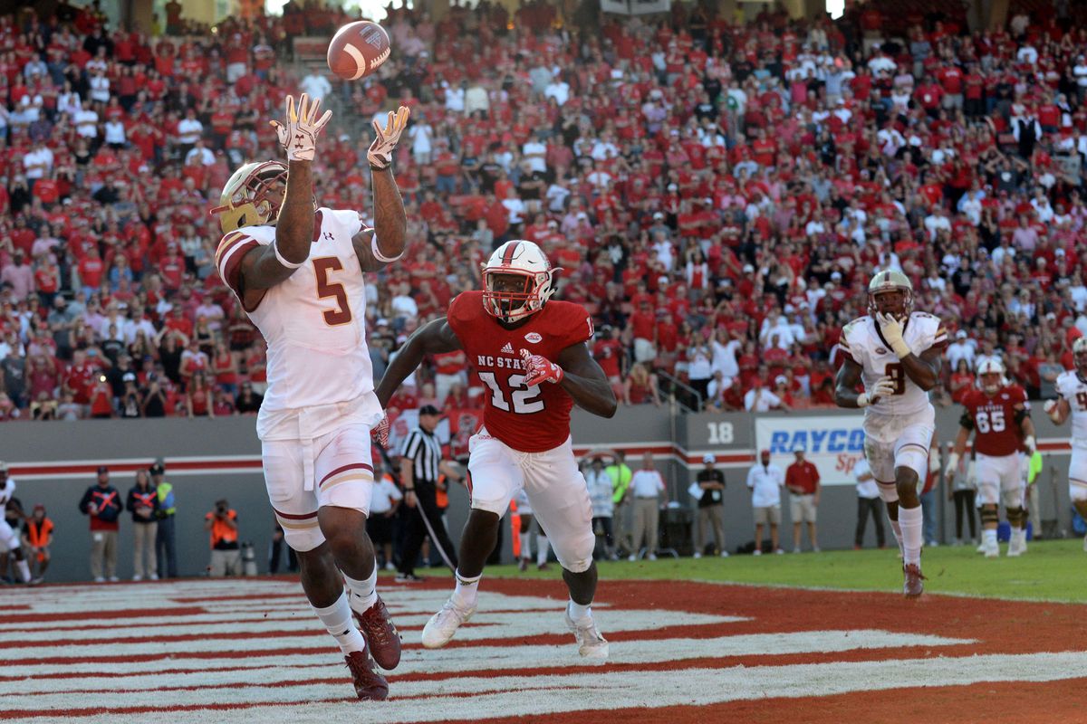 Raleigh, NC, USA; Boston College Eagles  defensive back Kamrin Moore  (5) intercepts a pass in the end zone during the second half against the  North Carolina State Wolfpack at Carter Finley Stadium.