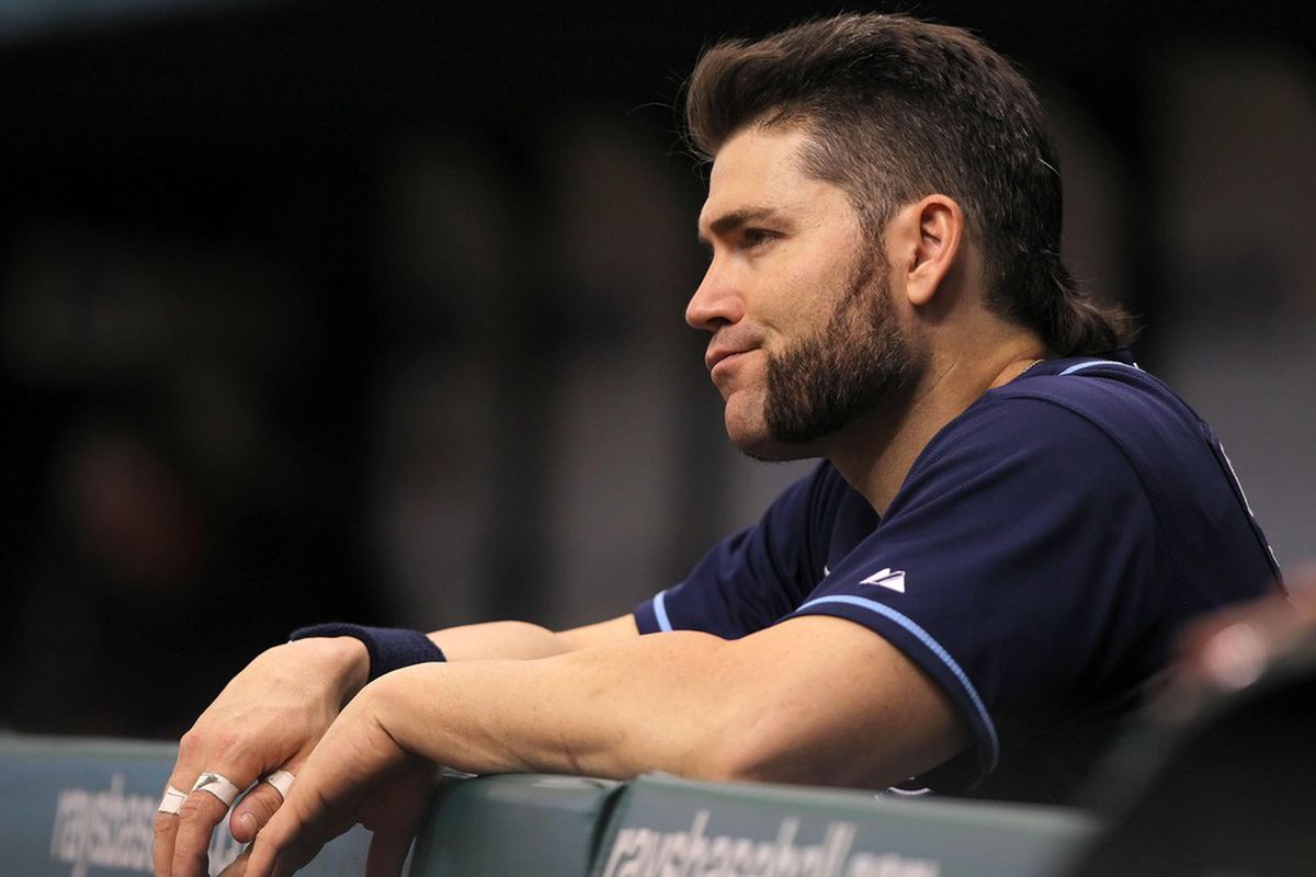 St. Petersburg, FL, USA; Tampa Bay Rays designated hitter Luke Scott (30) reacts in the dugout against the Chicago White Sox at Tropicana Field. Chicago White Sox defeated the Tampa Bay Rays 4-3. Mandatory Credit: Kim Klement-US PRESSWIRE