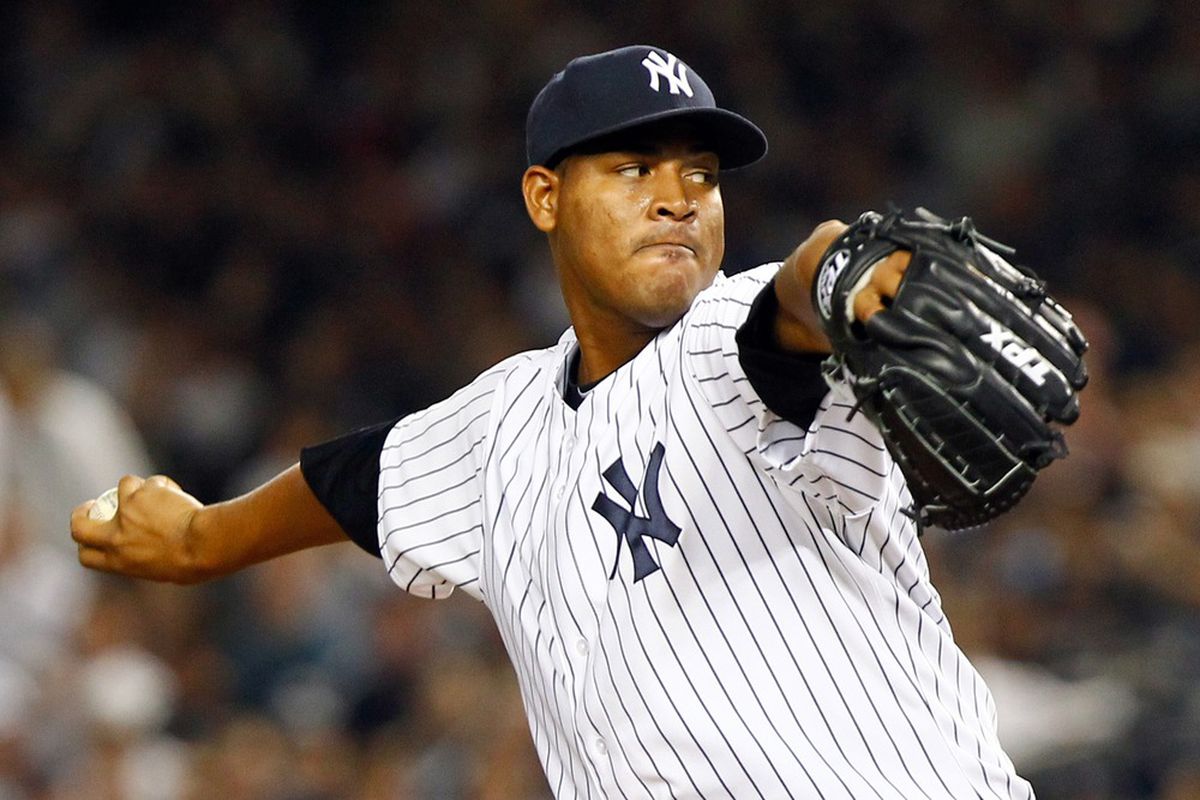 Apr. 15, 2012; Bronx, NY, USA; New York Yankees starting pitcher Ivan Nova pitches during the second inning against the Los Angeles Angels at Yankee Stadium. Mandatory Credit: Debby Wong-US PRESSWIRE