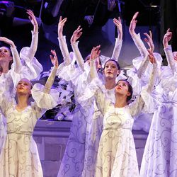 Dancers perform during a performance of Christmas with the Mormon Tabernacle Choir, Orchestra on Temple Square and Bells on Temple Square at the Conference Center in Salt Lake City Thursday, Dec. 17, 2015.