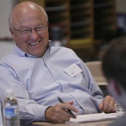Sterling Scholar judge and author Dean Hughes laughs with a finalist during an interview in Murray on March 2, 2011.