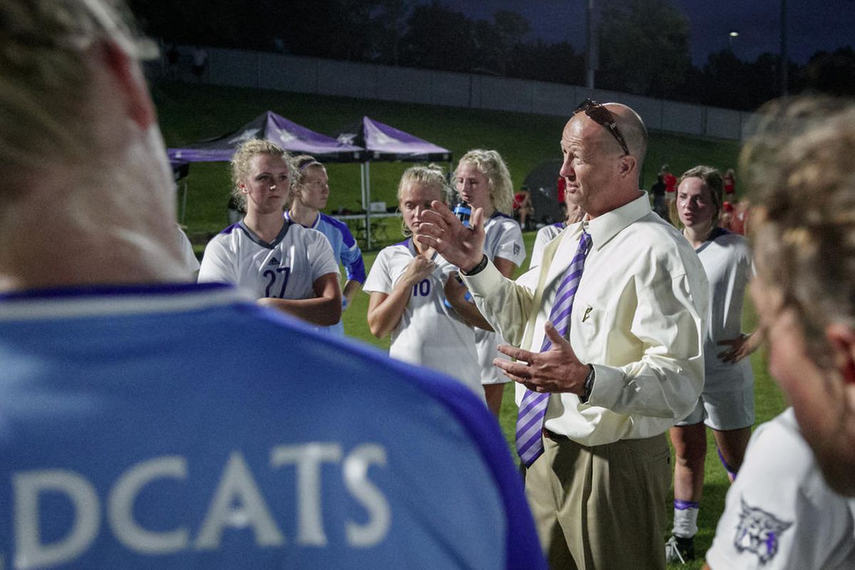 Weber State University head women's soccer coach Tim Crompton (right-center) talks with the Wildcats following an exhibition match with Utah in Ogden on Aug. 12. Weber State opens its 2017 season on Friday against Wright State in Las Vegas.
