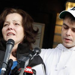 With her son Billy standing beside her, Patty Campbell, left, makes a statement to reporters outside her home in Medford, Mass., Tuesday, April 16, 2013. Campbell's daughter Krystle was killed in Monday's bombings at the finish line of the Boston Marathon. 