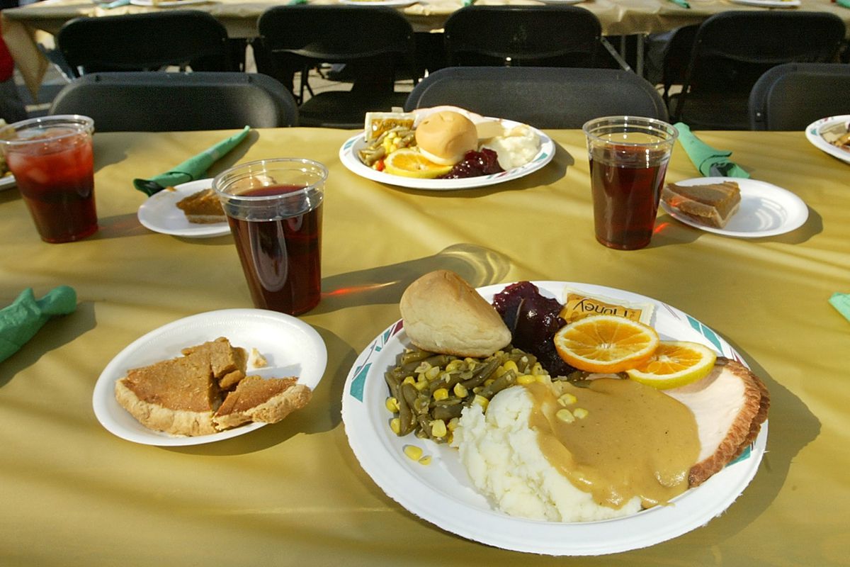 Los Angeles Mission Serves Turkey Dinner To Homeless