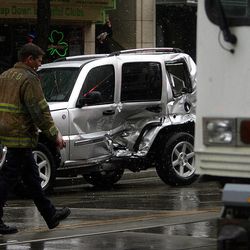 The automobile that collided with a TRAX train sits on Main Street in Salt Lake City on April 18, 2007.  