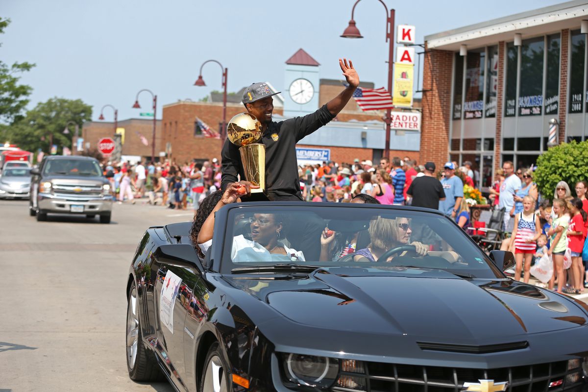 Harrison Barnes Attends Parade with the Larry O’Brien Championship Trophy