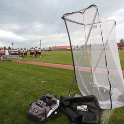 Kicking equipment on the sideline during the Alta and East prep football game in Salt Lake City, Friday, Aug. 23, 2013.