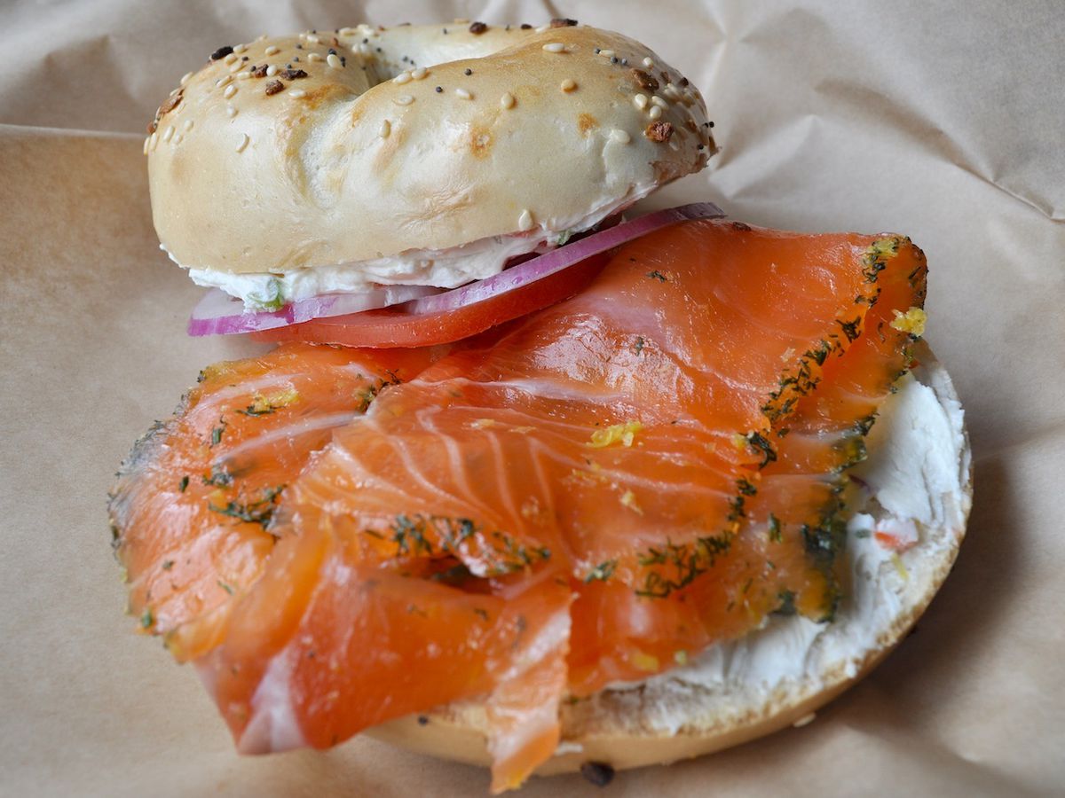 Bagel with gravlax, cream cheese, tomato, red onion, and capers