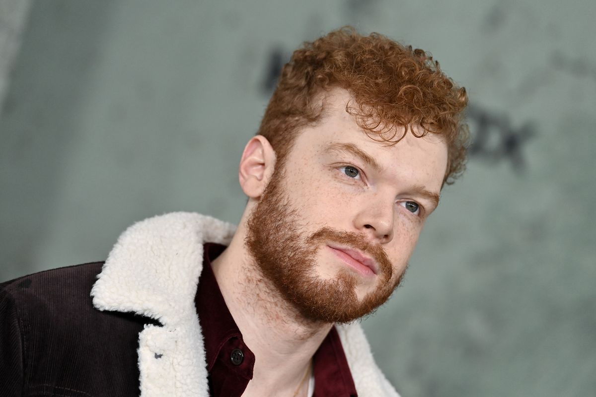 Cameron Monaghan&nbsp;sported some curly bangs and a short beard at The Last of Us LA premiere on Jan. 9, 2023.