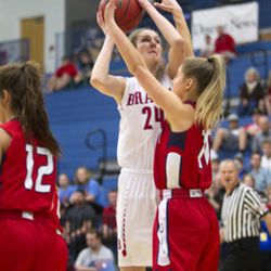 Bountiful\'s Kennedy Redding shoots over Springville\'s Savannah Sumsion in the first half of action Saturday, Feb. 27, 2016 at Salt Lake Community College in Salt Lake City.  