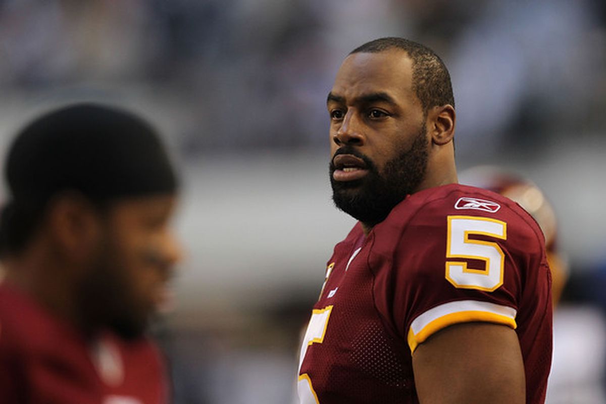 ARLINGTON TX - DECEMBER 19:  Quarterback Donovan McNabb #5  of the Washington Redskins on the sidelines against play against the Dallas Cowboys at Cowboys Stadium on December 19 2010 in Arlington Texas.  (Photo by Ronald Martinez/Getty Images)