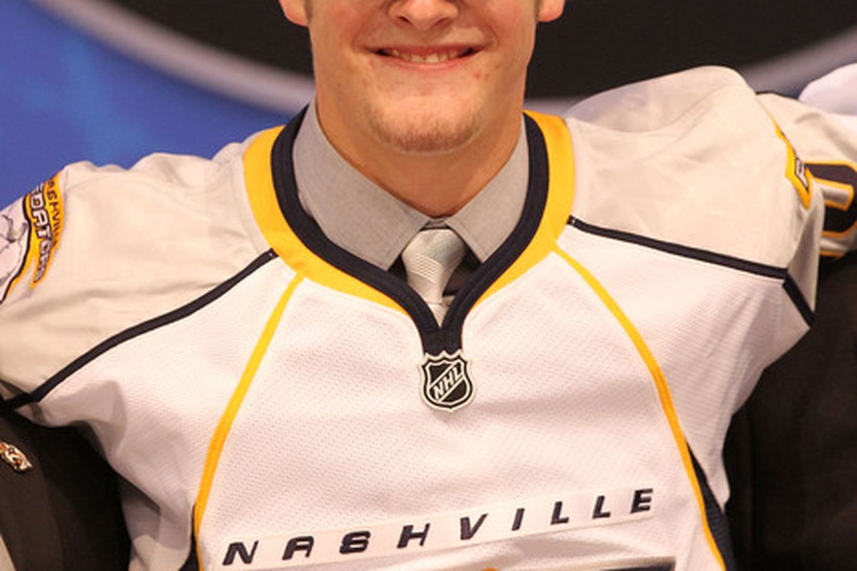 LOS ANGELES, CA - JUNE 25:  Austin Watson, drafted 18th overall by the Nashville Predators, poses on stage during the 2010 NHL Entry Draft at Staples Center on June 25, 2010 in Los Angeles, California.  (Photo by Bruce Bennett/Getty Images)