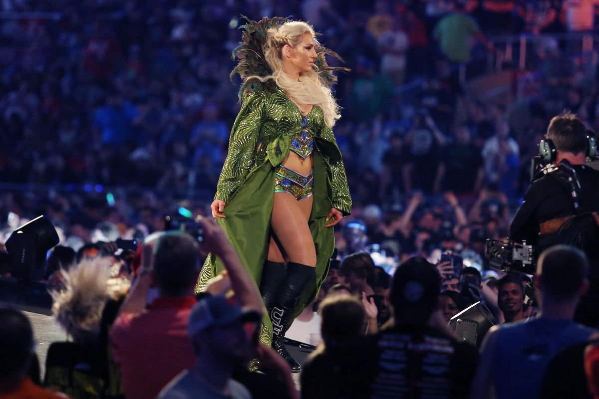 Charlotte Flair walks to the ring during WrestleMania 33 on Sunday, April 2, 2017 at Camping World Stadium in Orlando, Fla.