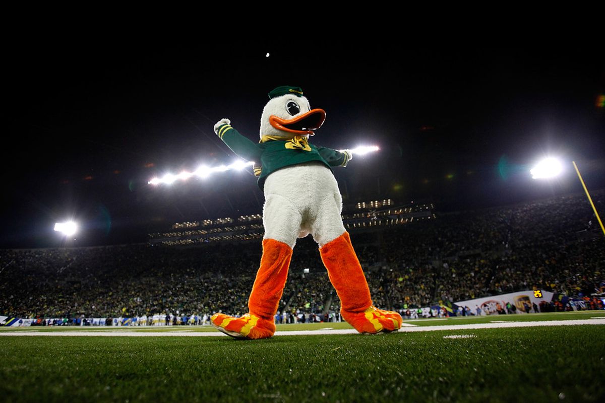 EUGENE, OR - DECEMBER 02:  Puddles the mascot of the Oregon Ducks celebrates against the UCLA Bruins  during the Pac 12 Championship Game on December 2, 2011 at the Autzen Stadium in Eugene, Oregon.  (Photo by Jonathan Ferrey/Getty Images)