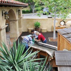 Visitors use an interactive display at the San Diego Mormon Battalion Historic Site.