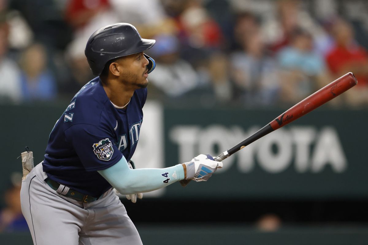 Julio Rodriguez of the Seattle Mariners doubles against the Texas Rangers during the first inning at Globe Life Field on September 23, 2023 in Arlington, Texas.