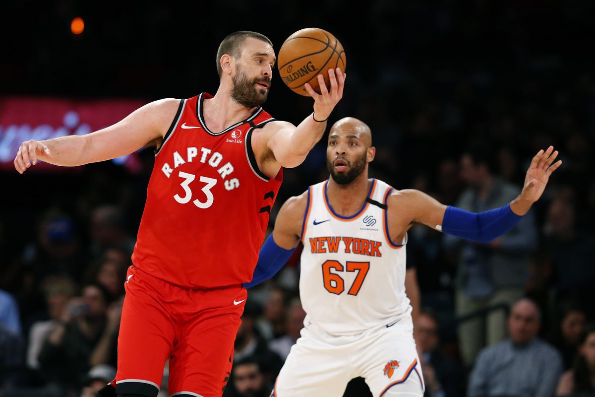Toronto Raptors center Marc Gasol controls the ball against New York Knicks center Taj Gibson during the second half at Madison Square Garden.