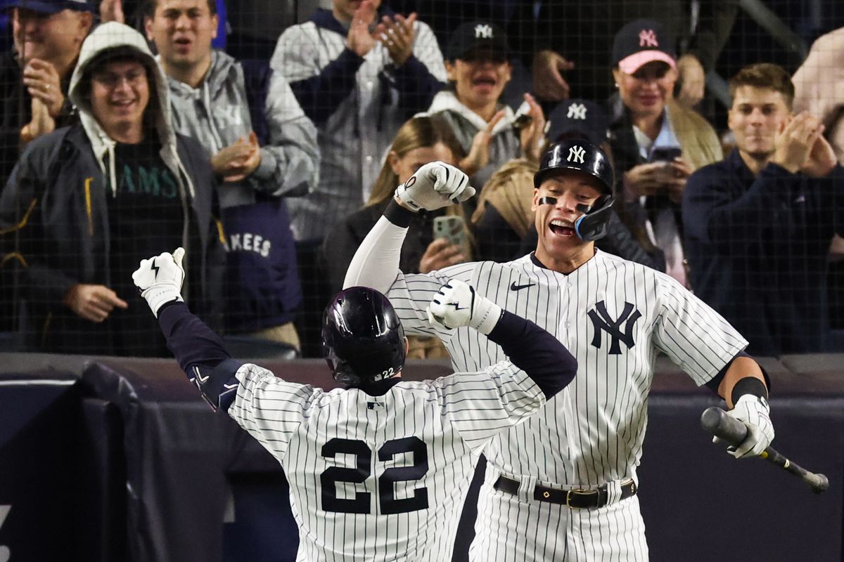 Harrison Bader of the New York Yankees celebrates his home run with Aaron Judge during the sixth inning against the Houston Astros in game four of the American League Championship Series at Yankee Stadium on October 23, 2022 in the Bronx borough of New York City.