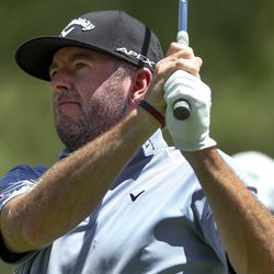 Robert Garrigus watches his tee shot on to the ninth hole during the first round of the Utah Championship at Oakridge Country Club in Farmington, Utah, on Thursday, June 27, 2019.
