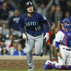 Seattle Mariners left fielder Jarred Kelenic (10) watches his solo home run against the Chicago Cubs during the ninth inning at Wrigley Field.