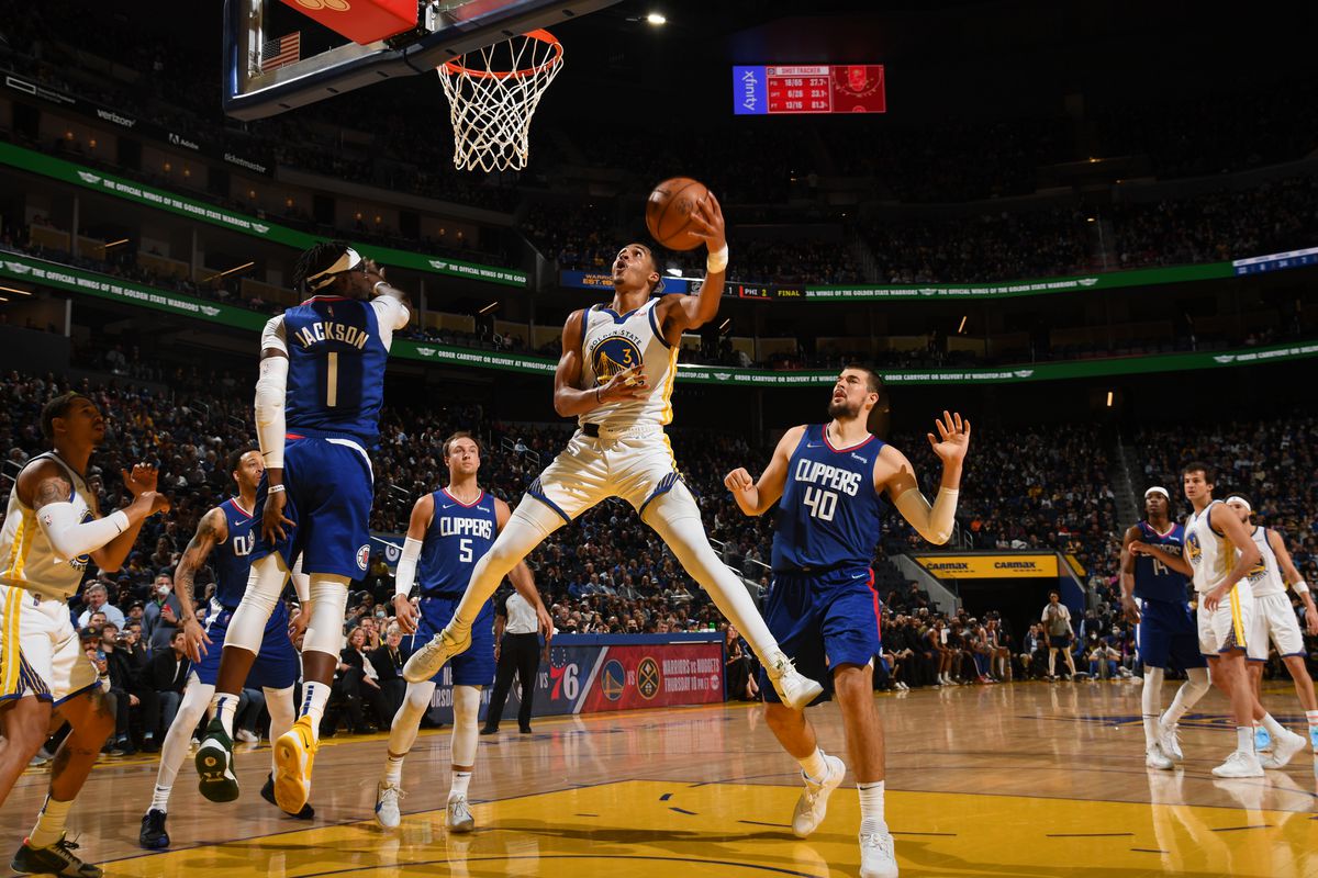 Jordan Poole #3 of the Golden State Warriors drives to the basket during the game against the LA Clippers on March 8, 2022 at Chase Center in San Francisco, California.