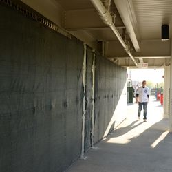 6:15 p.m. The bleacher patio walkway, under the left-field porch/video board - 
