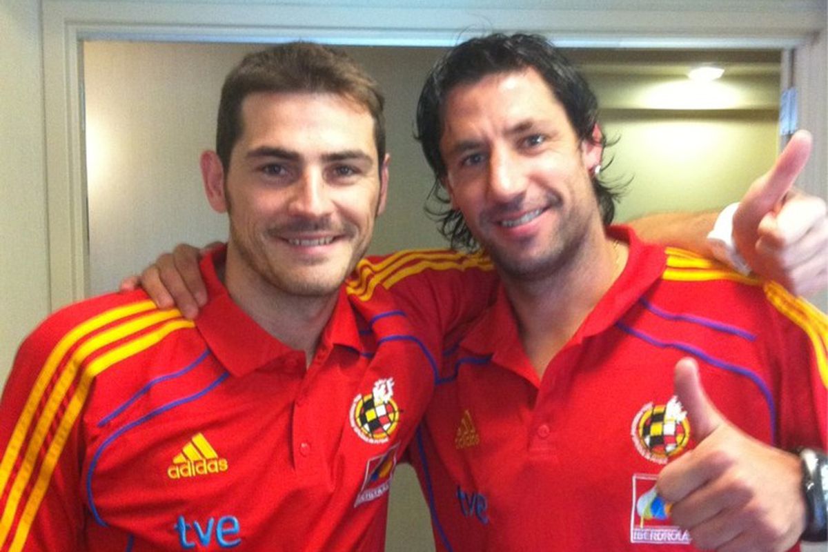 Joan Capdevila with captain Iker Casillas. 