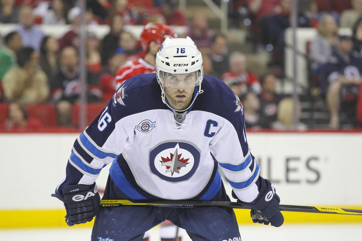 March 30, 2012; Raleigh, NC, USA; Winnipeg Jets left wing Andrew Ladd (16) against the Carolina Hurricanes at the PNC center. The Jets defeated the Hurricanes 4-3 in overtime. Mandatory Credit: James Guillory-US PRESSWIRE