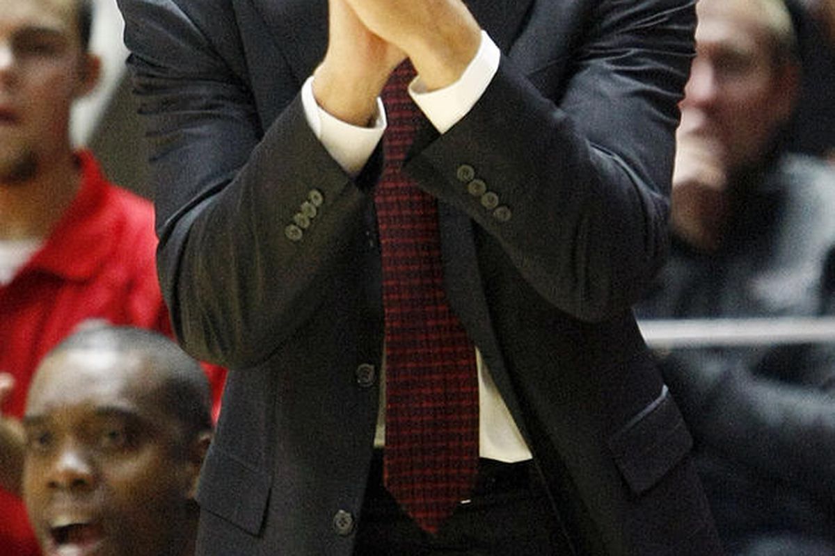 Southern Utah head coach Nick Robinson sheers his team on in an NCAA men's college basketball game against the Utah Utes at the Jon M. Huntsman Center in Salt Lake City, Friday, Nov. 13, 2015. 