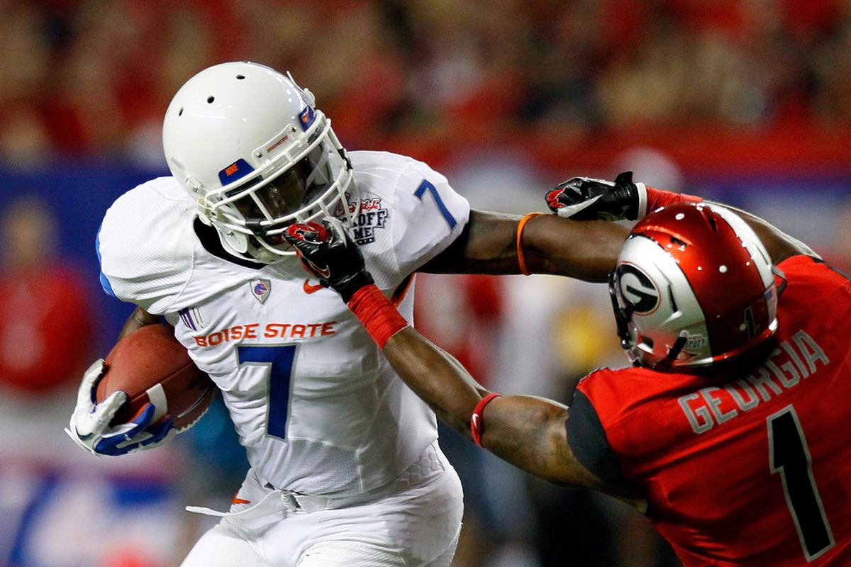 ATLANTA, GA - SEPTEMBER 03:  Branden Smith #1 of the Georgia Bulldogs is called for a facemask while tackling D.J. Harper #7 of the Boise State Broncos at Georgia Dome on September 3, 2011 in Atlanta, Georgia.  (Photo by Kevin C. Cox/Getty Images)