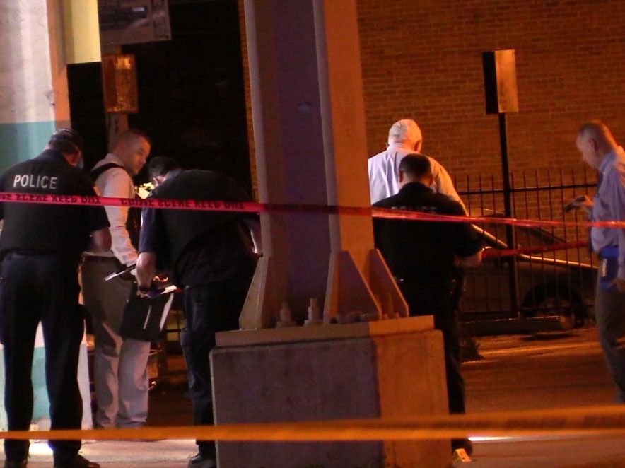 Police investigate a shooting about 11:30 p.m. Friday, June 15, 2018 in the 400 block of East 63rd Street in Chicago. | Justin Jackson/ Sun-Times