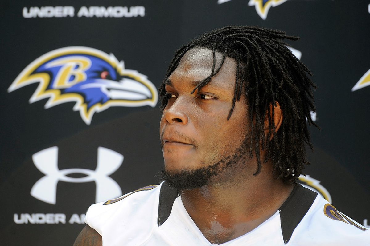 OWINGS MILLS, MD - MAY 13:  Courtney Upshaw #91 of the Baltimore Ravens speaks to the media after taking part in a practice during the Baltimore Ravens minicamp on May 13, 2012 in Owings Mills, Maryland.  (Photo by Patrick McDermott/Getty Images)