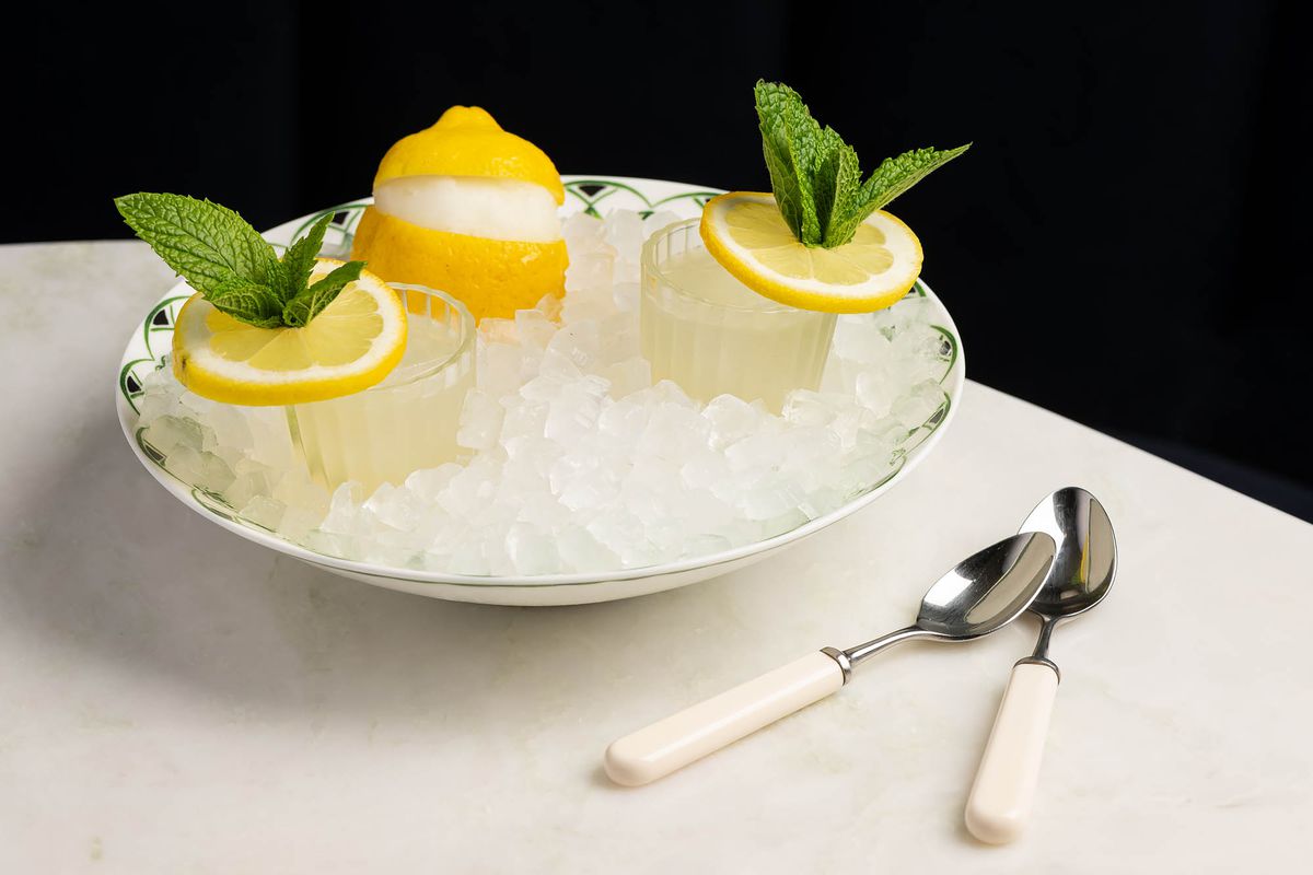 Three lemon-flavored cocktails in a bowl filled with ice at Dante Beverly Hills.