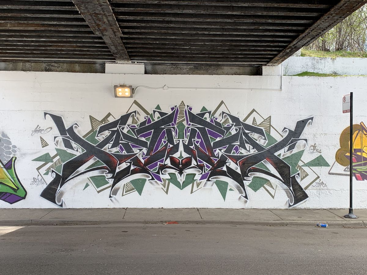 This graffiti-style art that’s part of a mural in Back of the Yards was done by an artist who goes by xhaust.