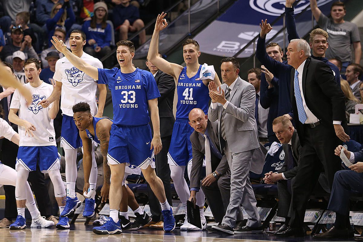 Brigham Young Cougars' bench celebrates a three point shot as BYU and Gonzaga play in an NCAA basketball game in the Marriott Center in Provo on Saturday, Feb. 24, 2018.