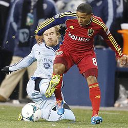 Kansas City's Chance Myers slide tackles Real's Joao Plata as Real Salt Lake and Sporting KC play Saturday, Dec. 7, 2013 in MLS Cup action. Sporting KC won in a shootout.