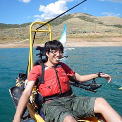 An entertainment arts and engineering student at the University of Utah tests the Tetra-Sail device on a Utah Lake.
