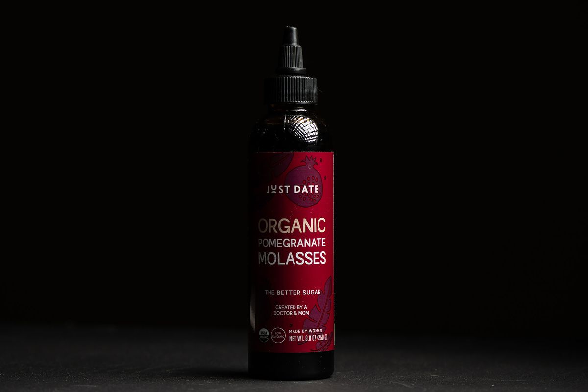 A bottle of Just Date pomegranate molasses.