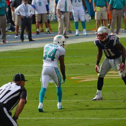 Dec. 15, 2013 Miami Gardens, FL - Miami Dolphins running back Marcus Thigpen (34) lines up against New England Patriots linebacker Jamie Collins (91) in the second quarter of the teams' Week 15 meeting.