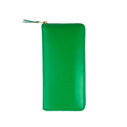 CDG Zipup Wallet (<a href="http://rsvpgallery.com/womens/cdg-zipup-wallet-green.html">$137.50, down from $275</a>)