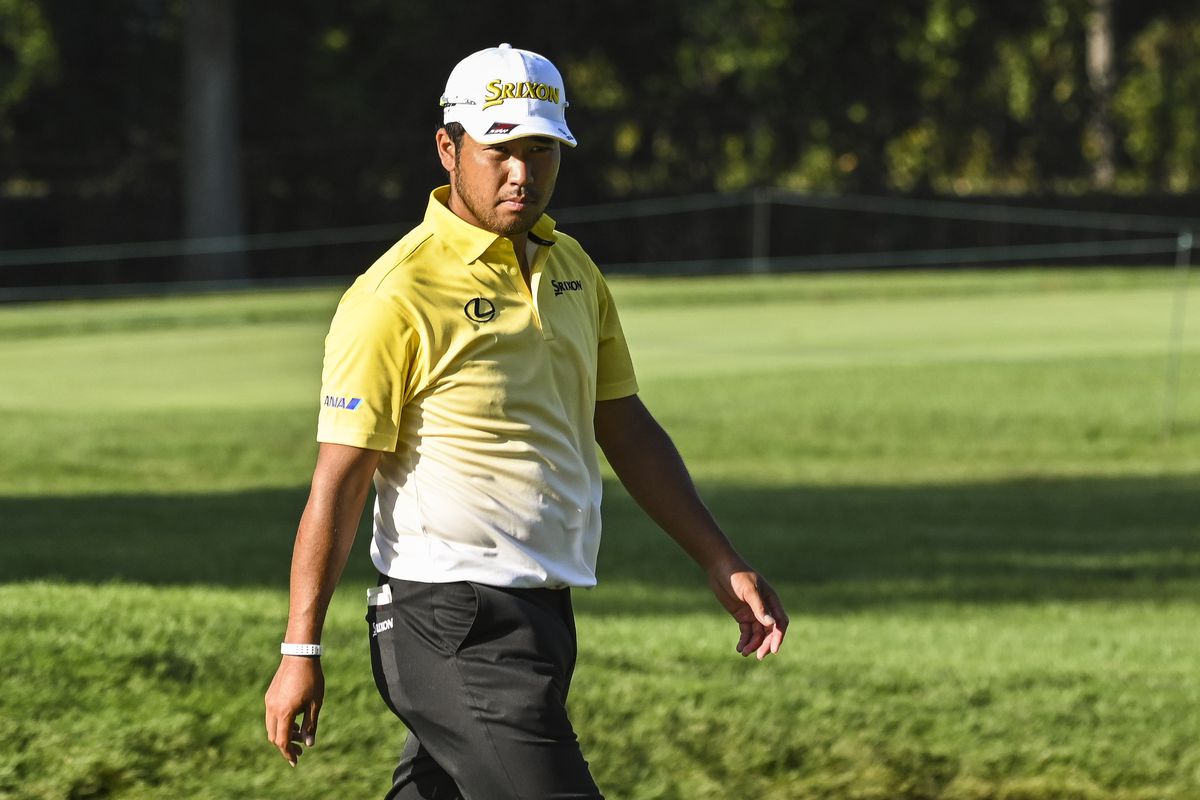 Hideki Matsuyama of Japan walks off the sixth hole during the first round of the BMW Championship on the North Course at Olympia Fields Country Club on August 27, 2020 in Olympia Fields, Illinois.