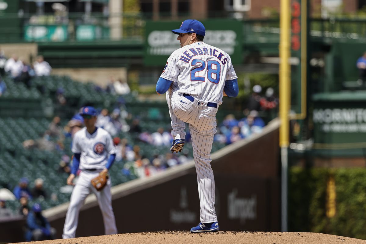 Cubs starting pitcher Kyle Hendricks delivers against the Pirates during the first inning of Sunday’s game. 